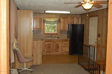 Living area to kitchen