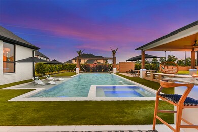 From the patio, a mesmerizing view opens up, revealing the expansive pool, ideal for a myriad of activities. Whether you're swimming laps for exercise, engaging in games with loved ones, or simply unwinding in the refreshing waters, the pool provides versatility and enjoyment for everyone. Additionally, nestled in the backyard is an in-ground trampoline, equipped with a water pump beneath it to address rainy days. Don't miss the opportunity to explore all the features this home has to offer.