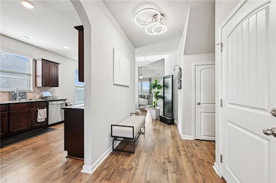 Foyer with Kitchen to the left and Living Room in