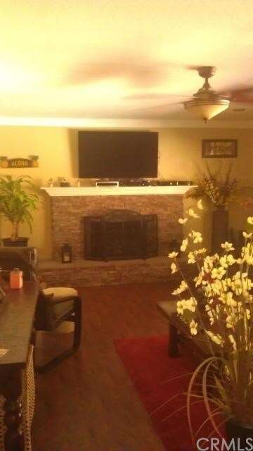 Updated Stone Fireplace in Living Room. Rich Wood 