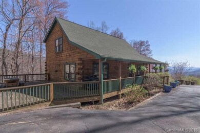 Log home offers spacious deck and breath taking vi