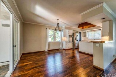 Dining area is between living room and kitchen