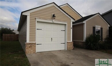 Privacy fenced back yard and single car garage