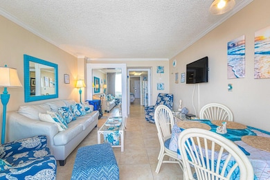 Living area with light tile patterned flooring, cr