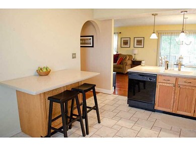 Kitchen. Solid surface counters and tile floors ar