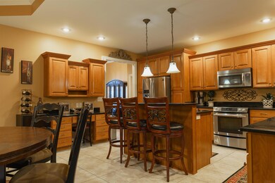 Breakfast bar, built in desk, wine cooler