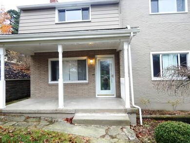 Welcome to this updated home with a covered Front 