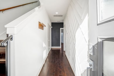 Bright and inviting entryway with modern finishes.