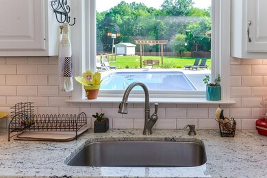 Perfect, unobstructed view of the pool from your kitchen sink!