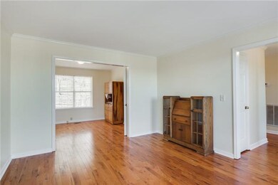 Beautiful new hardwoods throughout, this living room will be cozy!