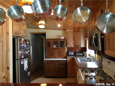 Kitchen. Updated kitchen w/ antique cupboard that 