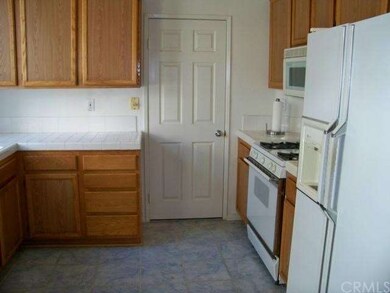 Kitchen With Door To Dining Room