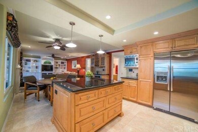 Kitchen Island has Storage and Electrical Outlet