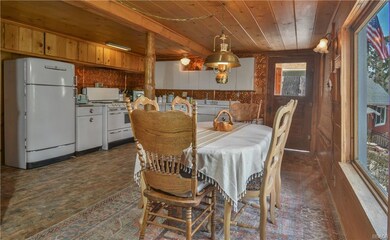 Vintage kitLowest Level - Kitchen with heated bric