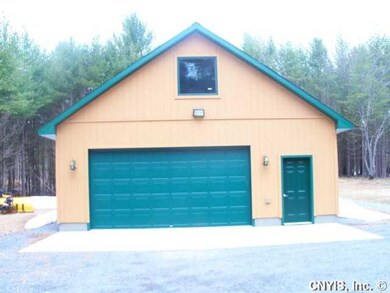 Exterior Front. Garage is 32x28, radiant heat, sep