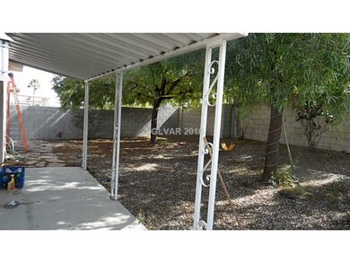 Property Photo. Backyard & Covered Patio