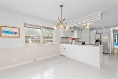 Gleaming dining and kitchen