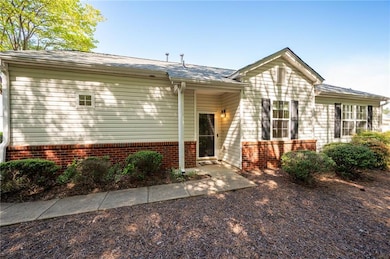 View of front of house featuring brick siding