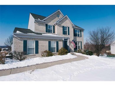 Exterior Front. 2 car attached garage & level entr