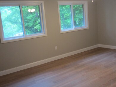 Spacious, recessed lights, new floors and paint.