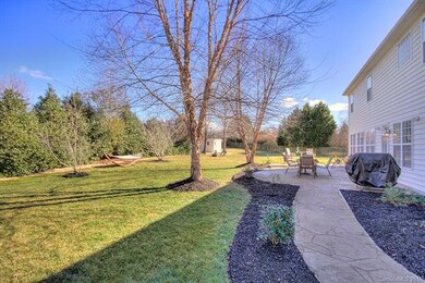 Serene private yard, mature landscaping, stamped c