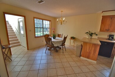 breakfast room & stairway to bonus room