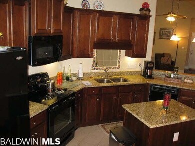 Lots of cabinets & center island.