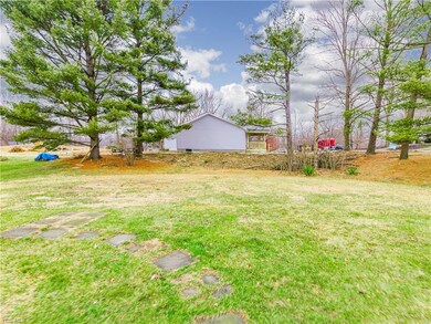 Backyard has plenty of room for a firepit, garden 