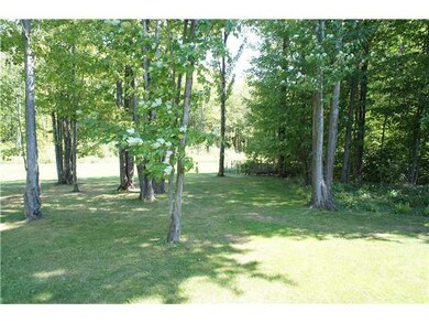 Exterior Back. Relax in the shaded yard or build a