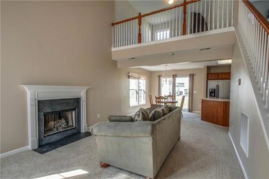 Cathedral ceilings, great natural light, and woodburning fireplace create an open yet warm space to relax or to entertain.