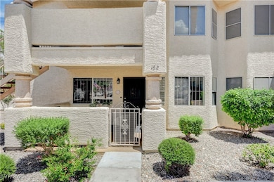 View of front of property with stucco siding and a