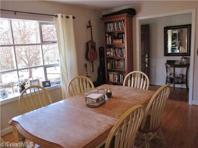 Dining Room. The living room is holding the dining room