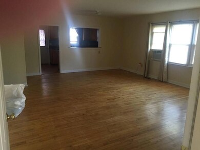 Large living room and hardwood...