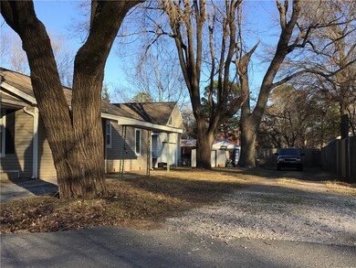 Carport and extra driveway