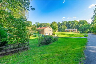 back of corner lot with side view to neighborhood