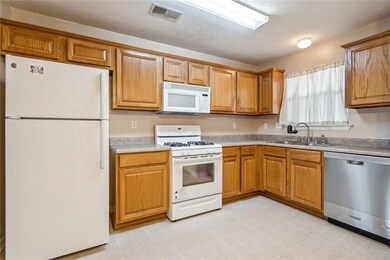 Refrigerator, washer, & dryer included.