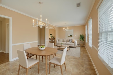 Open to the kitchen is the breakfast area and hear
