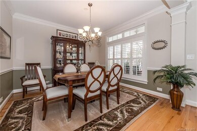 Formal Dining Room with chair rail and crown moldi