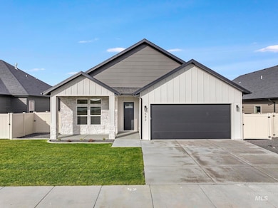 Modern farmhouse featuring a gate, board and batten siding, an attached garage, concrete driveway, and stone siding