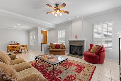 Living room featuring light tile patterned floors