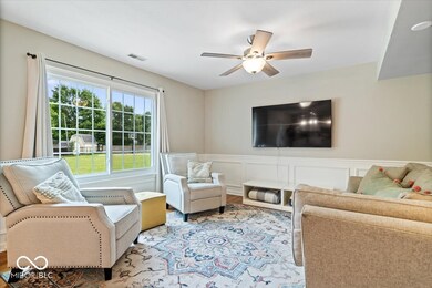 Large windows throughout flood the house with natural light.