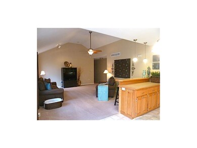 Open living/kitchen with eat-at bar