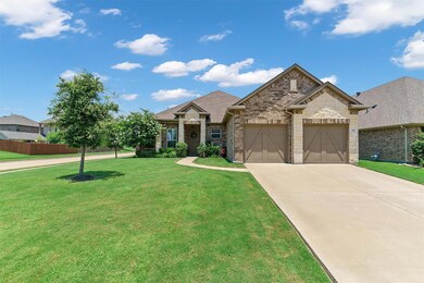 Craftsman-style home featuring a front yard and a 