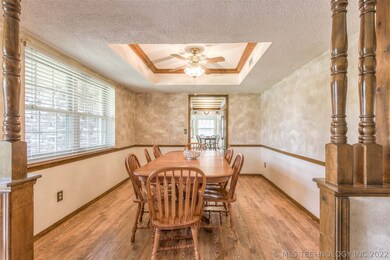 Formal dining off the entry with trayed ceiling, c