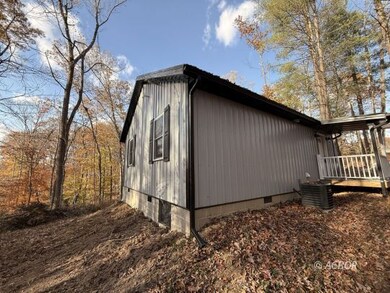 Side away from the driveway