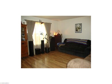 Nice sized living room with wood floors.