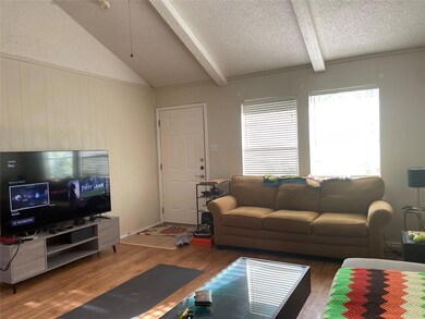 Living area featuring wood finished floors and a 