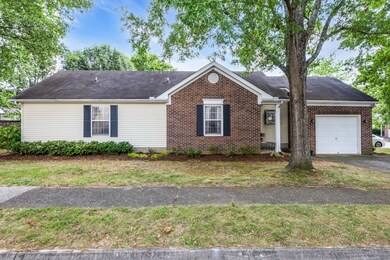 This home is nestled on a corner cul-de-sac lot and features a one-car garage.