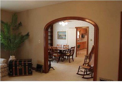 Gleaming wood trim, enticing floor plan that flows