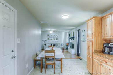 13702 S Hickory Pl - Dining to Living Room